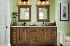 traditional_cherry_bathroom_cabinets_in_sage_finish